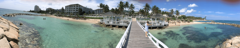 the best luxury resorts in Jamaica for families - Dock across the shallow water outside of Hyatt Ziva and Zilara resort