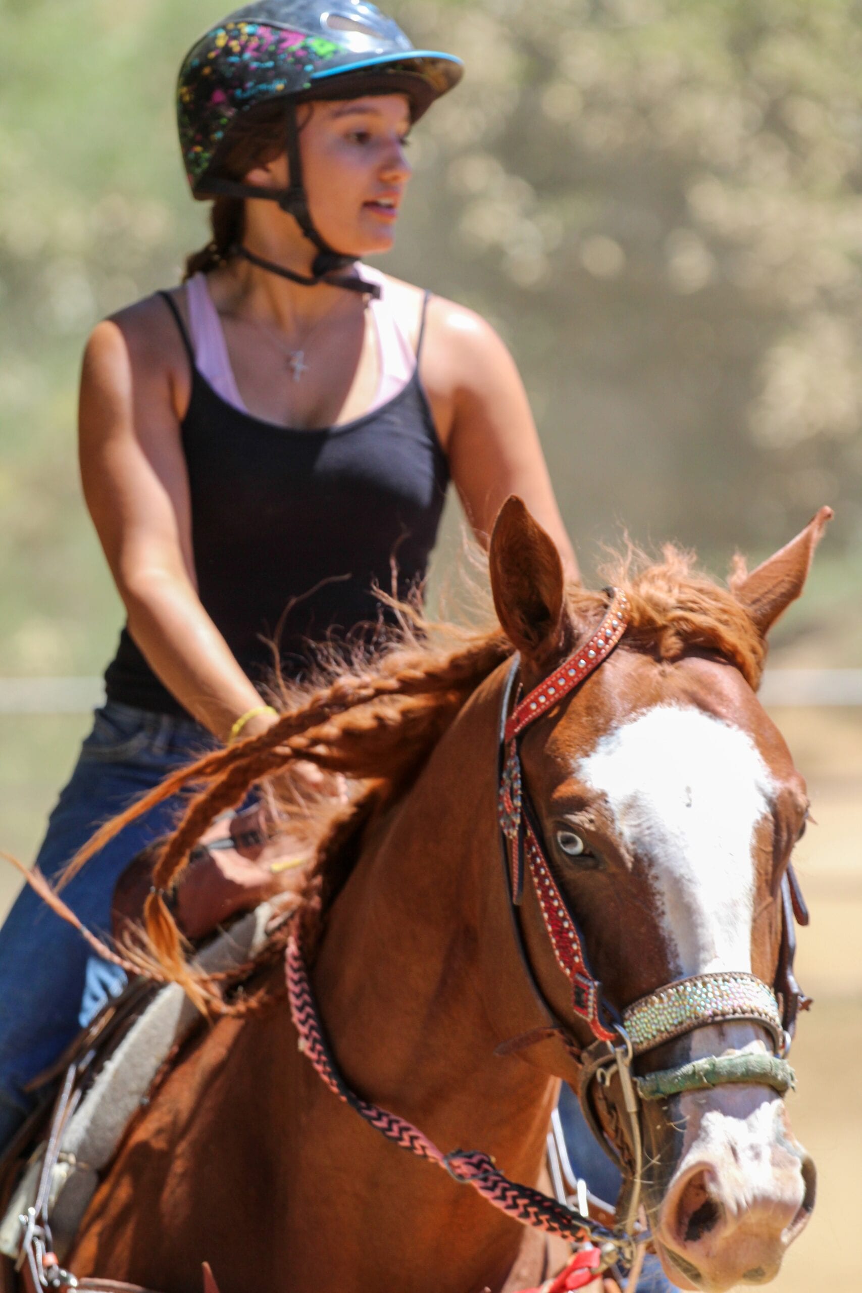 Photo by Christine Benton on Unsplash - Girl on a horse